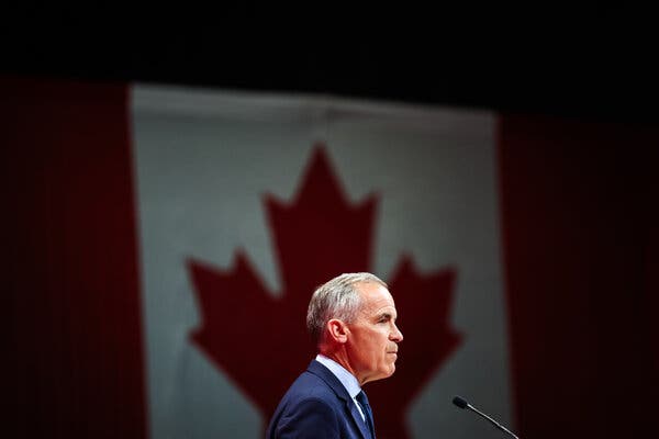 Prime Minister Mark Carney addresses supporters during election night in Ottawa on Monday.