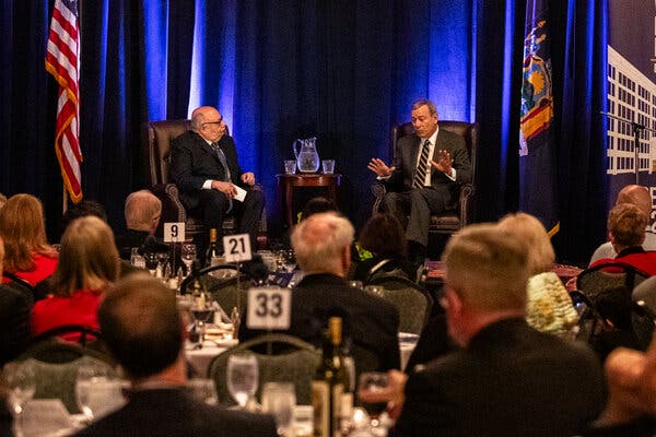 Chief Justice John G. Roberts Jr., right, engaged in conversation with Judge Lawrence J. Vilardo during the 125th anniversary celebration of the U.S. District Court for the Western District of New York in Buffalo.