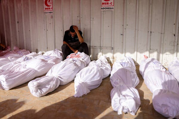 Deceased individuals at the Indonesian Hospital in Beit Lahia, northern Gaza, following overnight airstrikes that resulted in numerous casualties.
