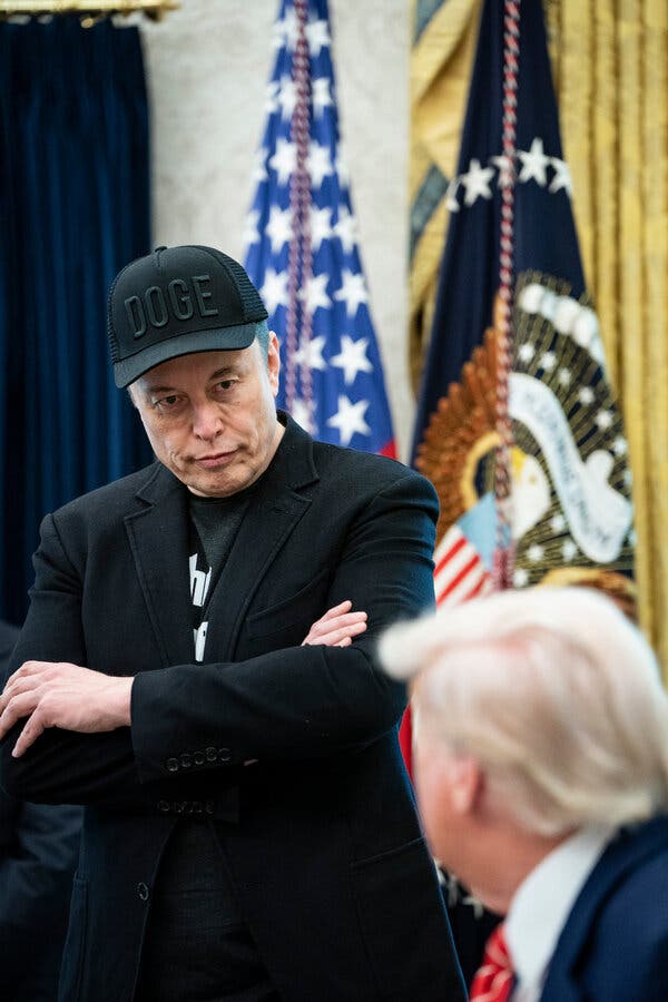 Elon Musk and President Trump meeting in the Oval Office last week. President Trump voiced criticism of Musk during a discussion with the German chancellor.