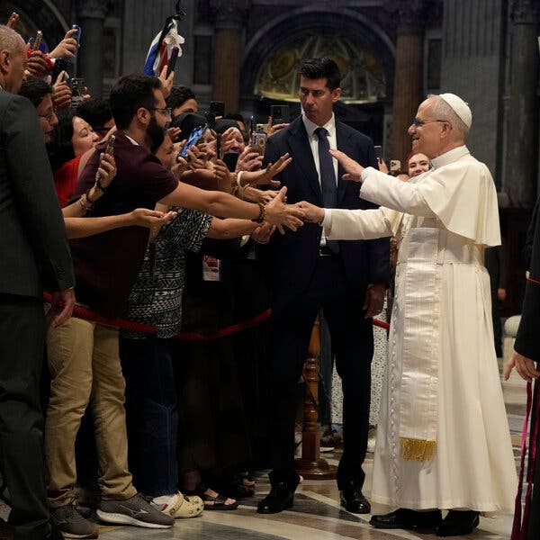 Pope Leo engaging with social media influencers.