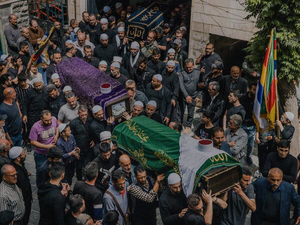 Funeral held for Druse militia fighters killed in clashes in Jaramana, a suburb of Damascus, on Wednesday.