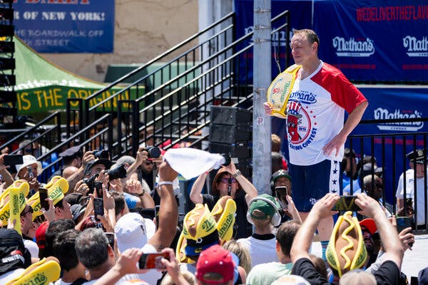 Joey Chestnut Triumphs in Nathan’s Hot Dog Eating Contest After Year-long Hiatus