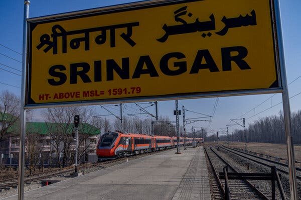 The Vande Bharat Express arrives at Srinagar railway station, marking a significant milestone in connecting Indian-administered Kashmir by rail during a recent trial.