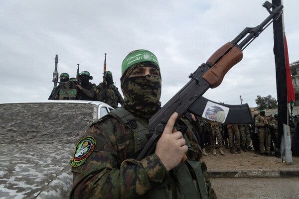 Hamas militants during the transfer of hostages in Gaza, February.