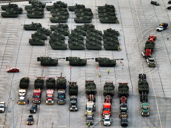 Military vehicles assembled in Jessup, Maryland, on Monday as preparations continue for the upcoming parade in Washington.