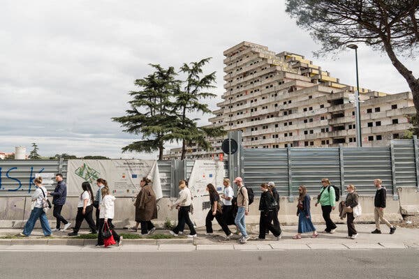 Vele di Scampia, a group of public housing towers in Naples featured in early seasons of 'Gomorrah,' currently being demolished.