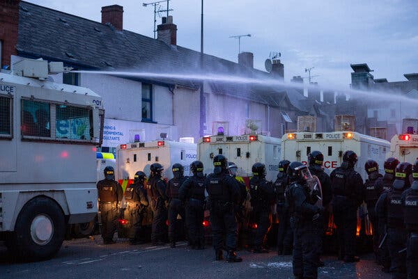 Police deploy water cannons against protesters in Ballymena, Northern Ireland, during Wednesday’s unrest.