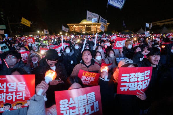 Protesters rally against President Yoon Suk Yeol in Seoul during December demonstrations.