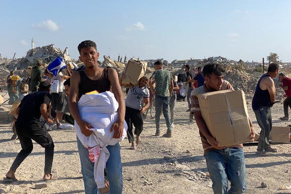 Tense moments at a food aid distribution point in Rafah as gunfire was reported nearby on Tuesday.