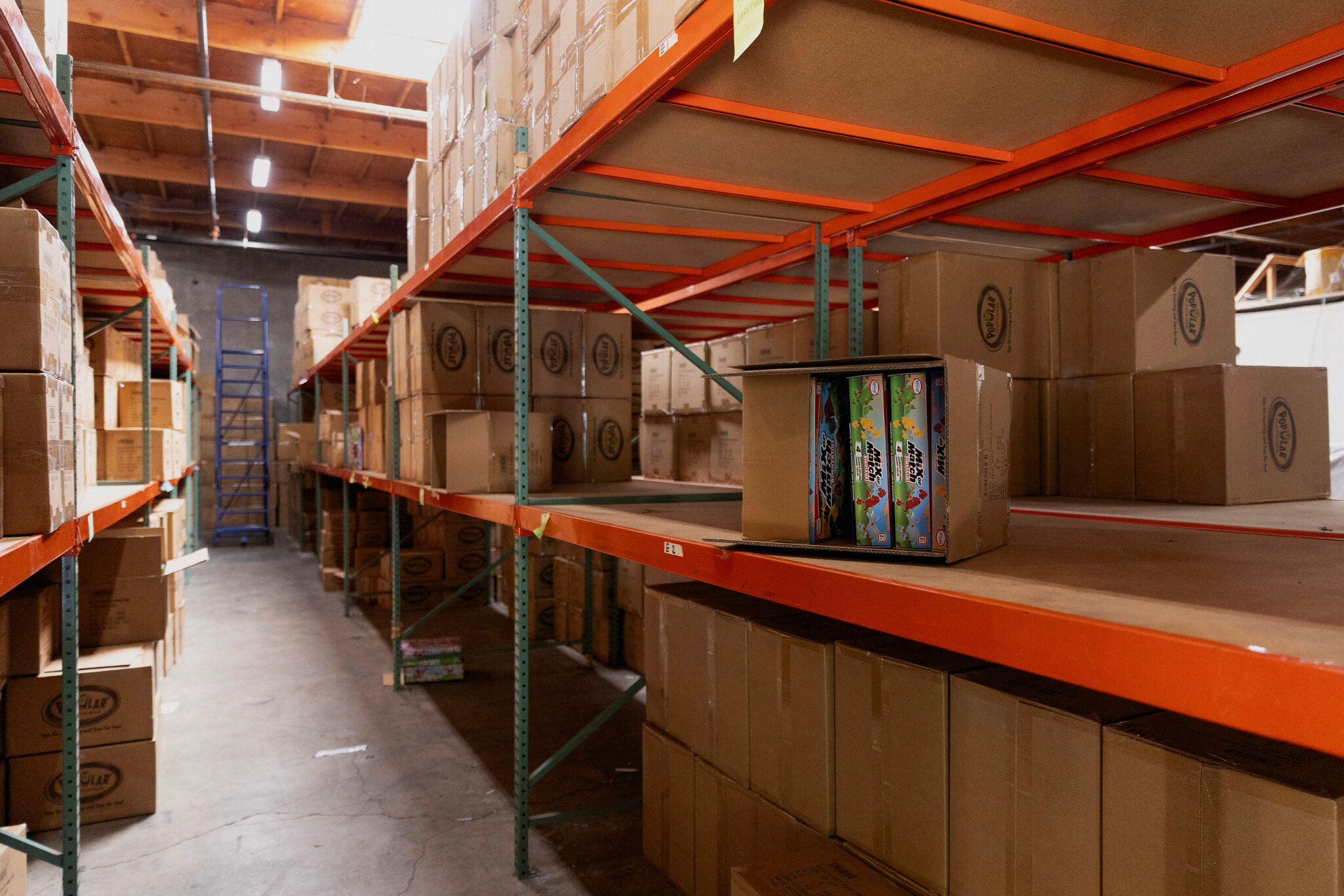 A Chinese toy manufacturing plant struggles to recover despite a temporary easing of U.S.-China tariffs, facing unsold inventory and difficulty rehiring workers.
