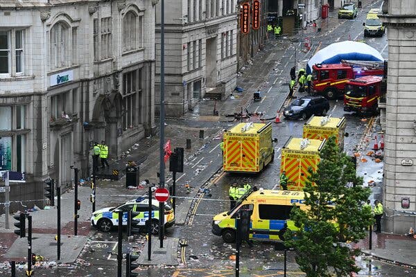 Emergency responders at the scene in central Liverpool after a vehicle drove into a crowded street filled with pedestrians.