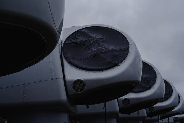 Nacelles, the sizable housings atop wind turbines, positioned outside Vestas’ factory in Odense, Denmark, a leading producer of wind energy equipment.